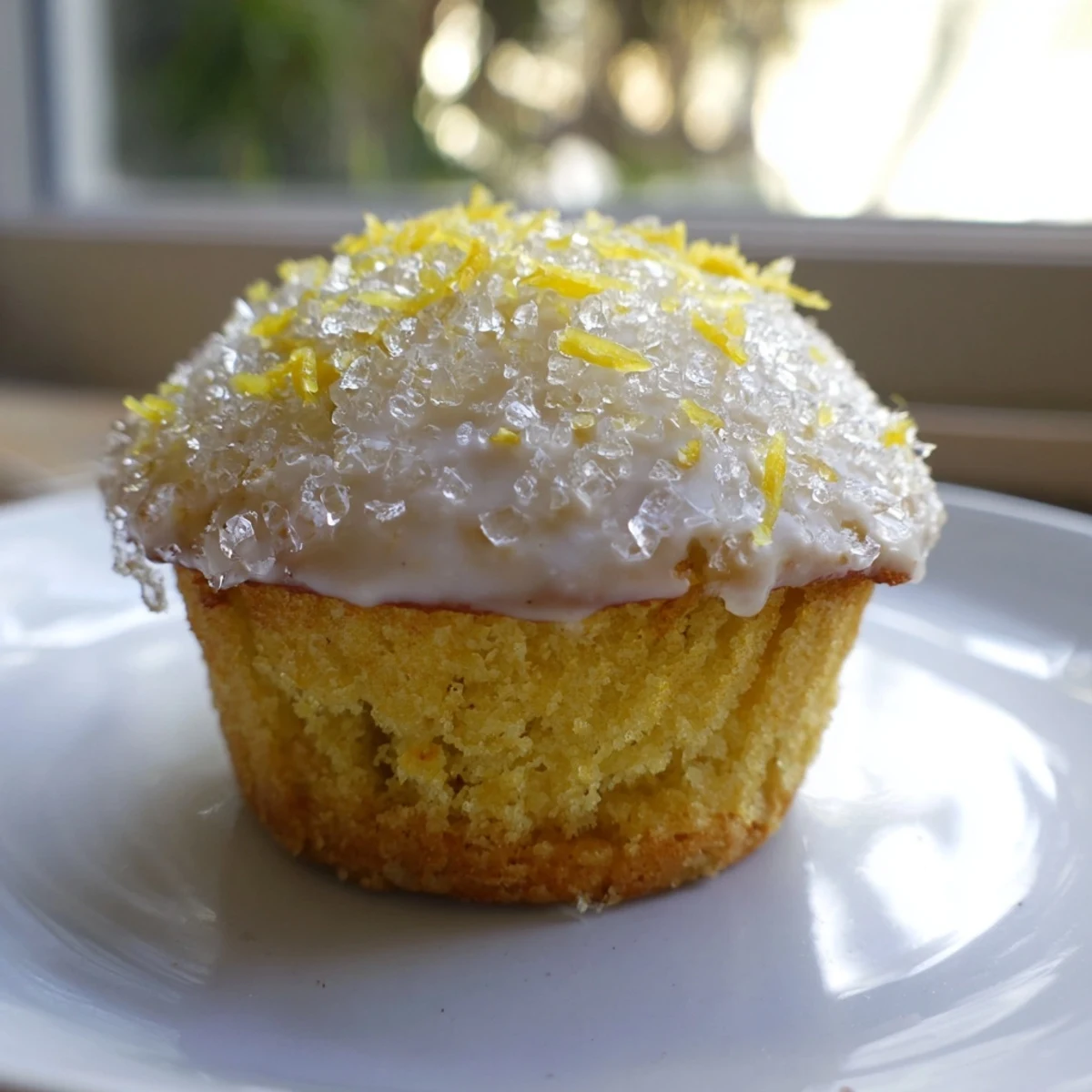 A close-up of a batch of Simple Sweet Lemon Zest Muffins, perfect for a delightful brunch spread.