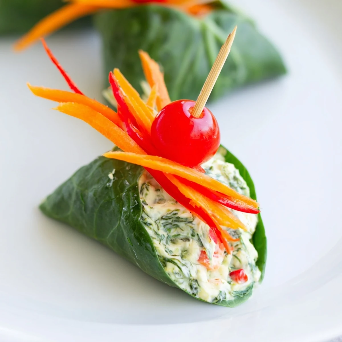 Close-up image shows vibrant Holly Leaf Spinach Wraps, ready to eat with attractive garnishes.