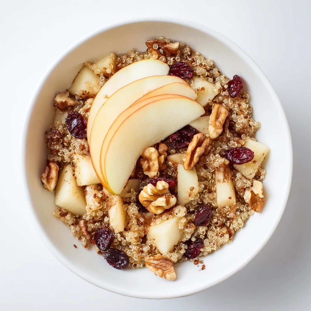 A nourishing bowl of Apple Cinnamon Quinoa, this cozy recipe is perfect for chilly mornings.
