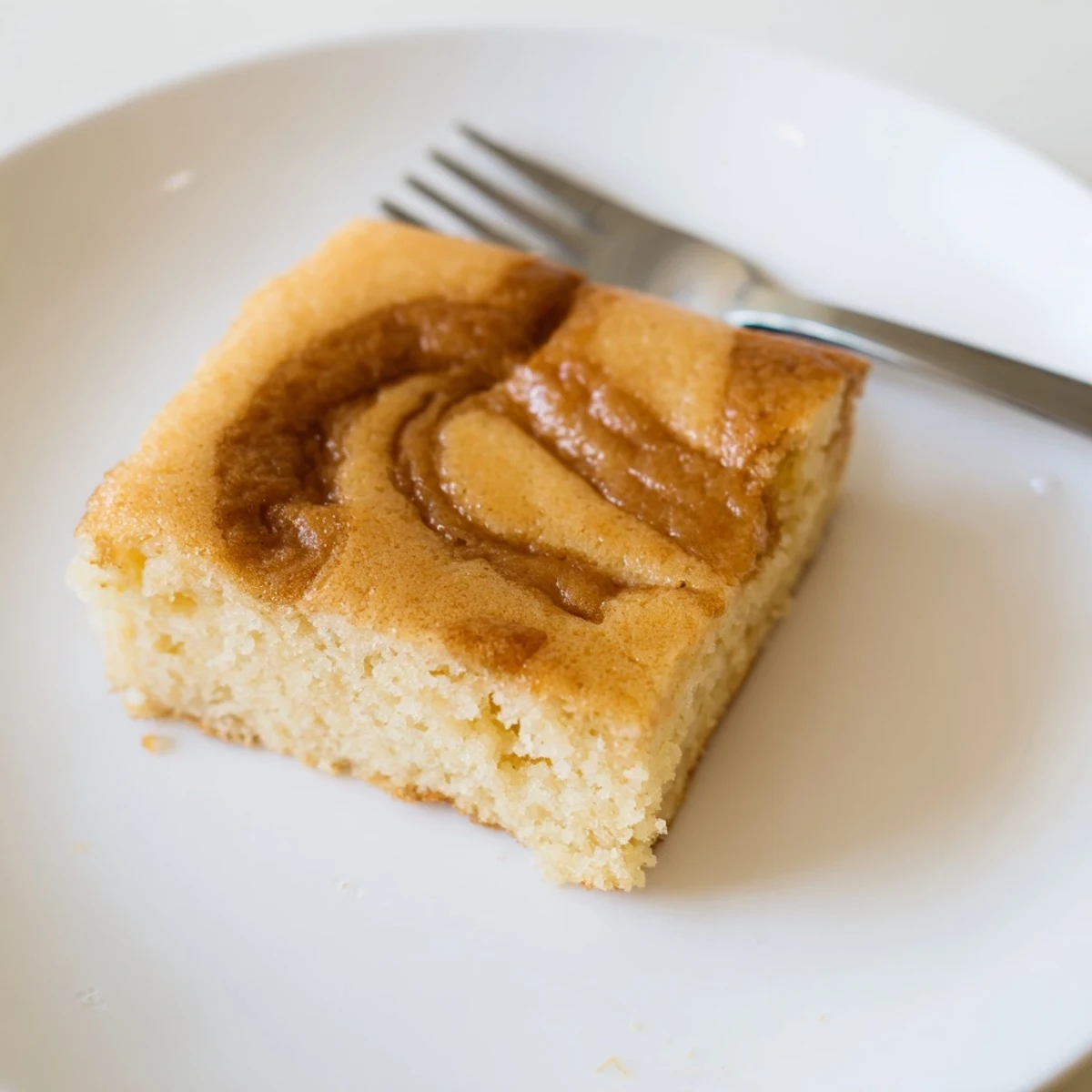 Imagine the texture of this peanut butter mochi cake, a gluten-free treat with delicious flavor.