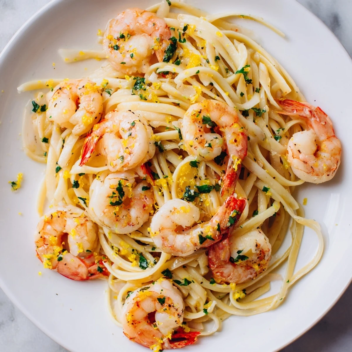 A visually appealing plate of Lemon Herb Pasta with Shrimp, ready to be enjoyed.