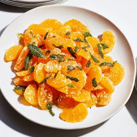 Bright clementine winter fruit salad with fresh mint: a sweet and zesty, easy healthy recipe.