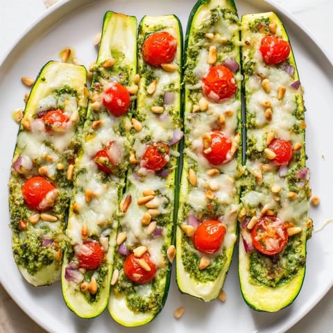 Cheesy Pesto Zucchini Boats