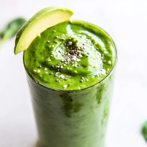 Enjoy the refreshing taste of this Spinach Avocado Smoothie, blended to a velvety, smooth texture.