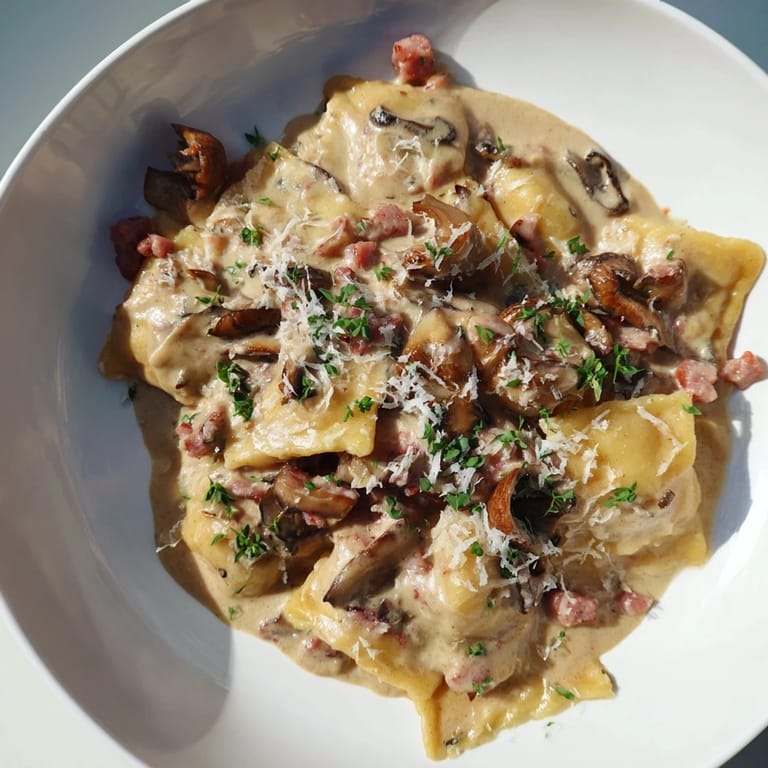 Beautiful close-up of the finished Woodsy Skillet Sausage and Mushroom Gnocchi, a filling American meal.