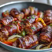 Vibrant sheet pan sausage and peppers with juicy sausages, sweet bell peppers, and caramelized onions roasted to perfection.